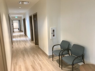 Modern commercial hallway with fresh professional paint finish